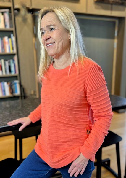 Hovedbilde Andrea knappegenser korall