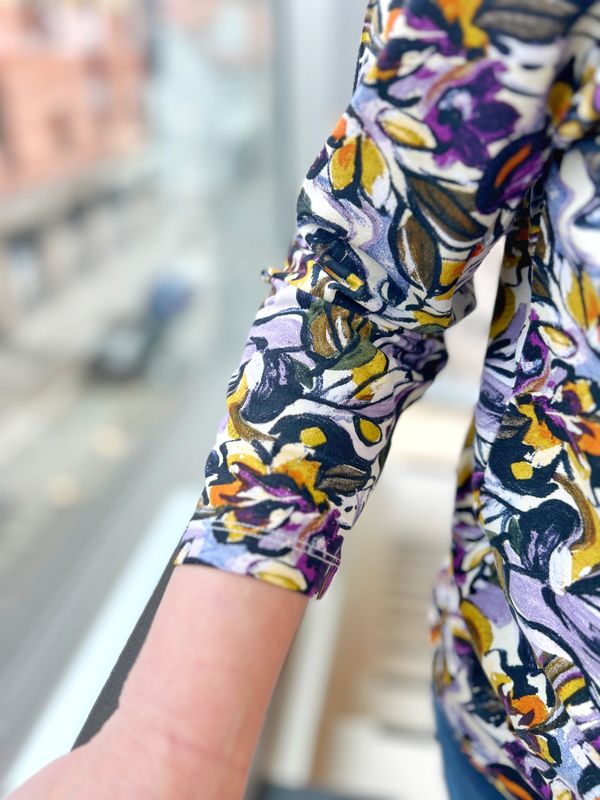 Sandra topp lilla blomster